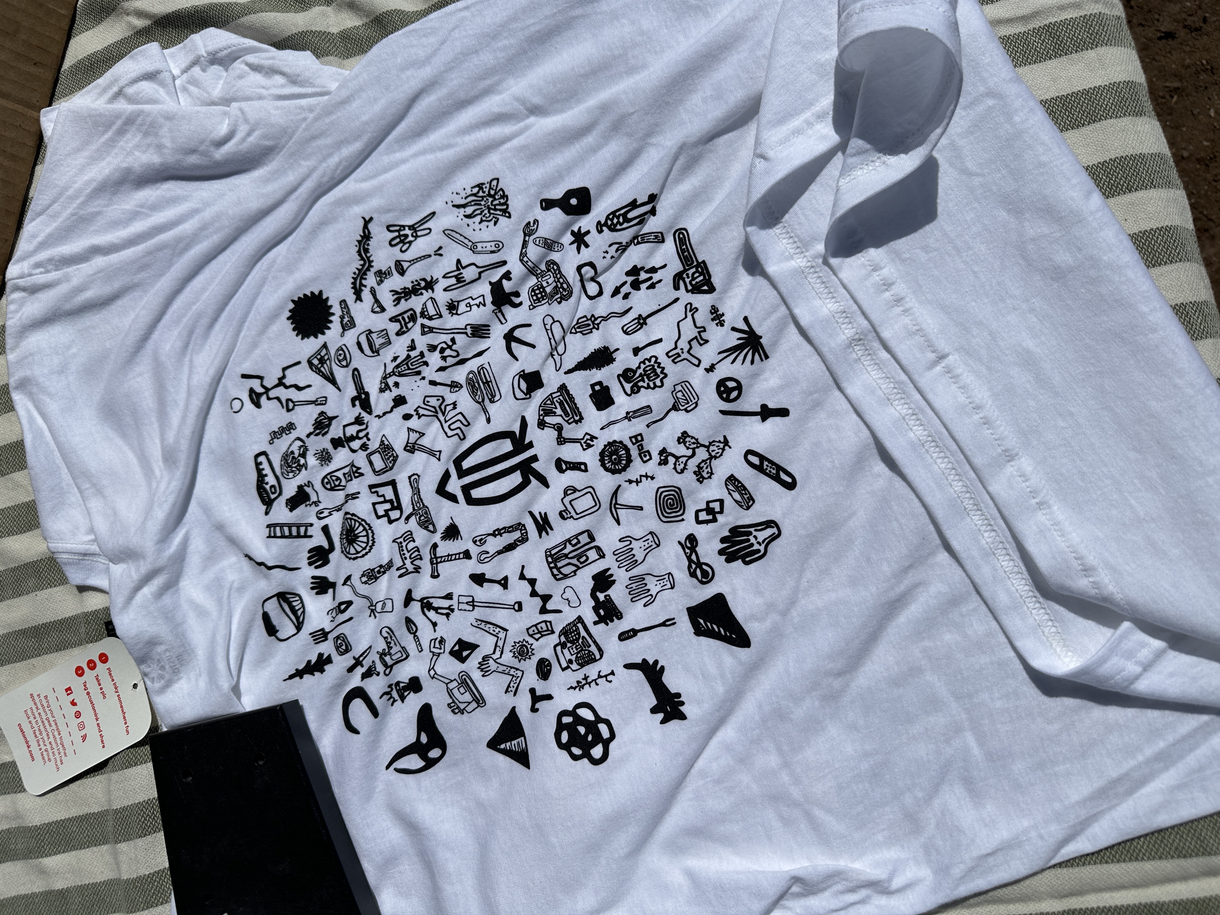 Rocket Ramps brand identity — printed t-shirt with hand-drawn icon circle